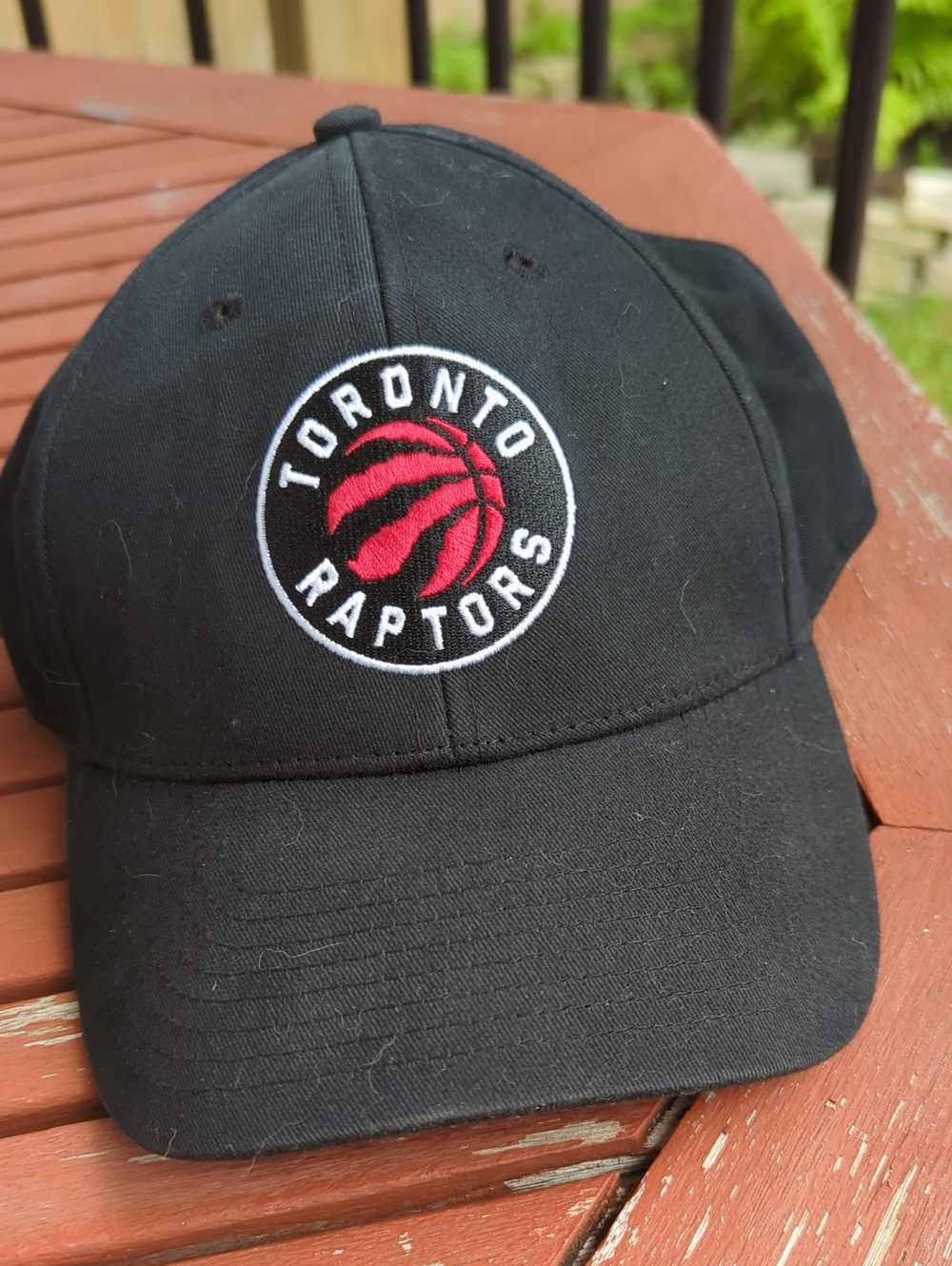 Toronto Raptors Black Baseball Cap with Red Logo
